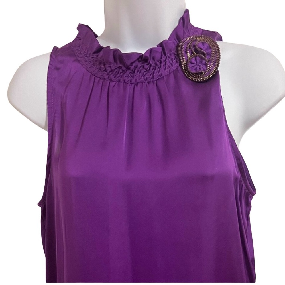 Beautiful purple sleeveless dress top with flower decoration
